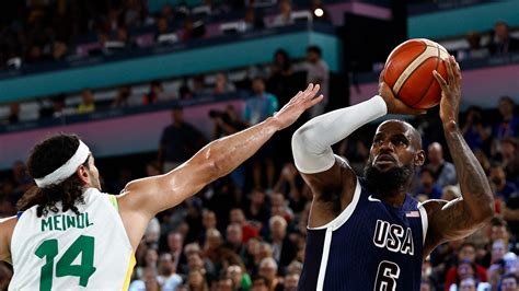 US men's basketball advances to semifinals with rout of Brazil.